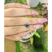 1.76 Ct. Greenish Blue Sapphire from Madagascar Life Style