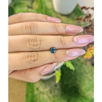 0.91 Ct. Greenish Blue Sapphire from Madagascar Life Style