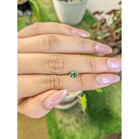 0.72 Ct. Bluish Green Sapphire from Madagascar Life Style