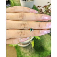 0.83 Ct. Green Sapphire from Madagascar Life Style