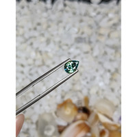 0.81 Ct. Bluish Green Sapphire from Madagascar Life Style