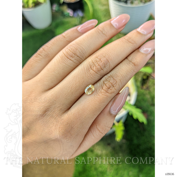 0.94 Ct. Orangish Yellow Sapphire from Ceylon (Sri Lanka)