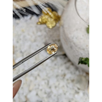 0.94 Ct. Orangish Yellow Sapphire from Ceylon (Sri Lanka) Life Style