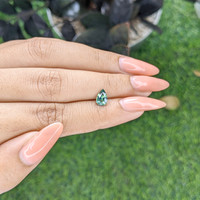 1.06 Ct. Bluish Green Sapphire from Madagascar Life Style