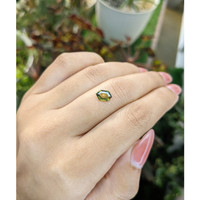 1.09 Ct. Yellowish Green Sapphire from Madagascar Life Style