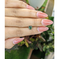 0.86 Ct. Green Sapphire from Madagascar Life Style