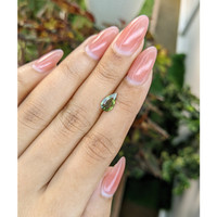 1.03 Ct. Yellowish Green Sapphire from Madagascar Life Style