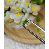 1.24 Ct. Yellowish Green Sapphire from Madagascar Life Style