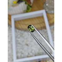 1.08 Ct. Yellowish Green Sapphire from Madagascar Life Style