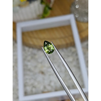 0.95 Ct. Yellowish Green Sapphire from Madagascar Life Style