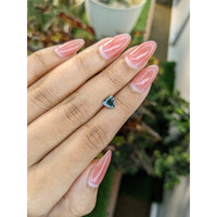 0.97 Ct. Green Sapphire from Madagascar Life Style