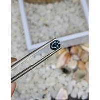 0.95 Ct. Greenish Blue Sapphire from Madagascar Life Style