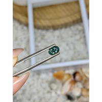 0.96 Ct. Bluish Green Sapphire from Madagascar Life Style