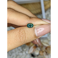 0.96 Ct. Bluish Green Sapphire from Madagascar Life Style