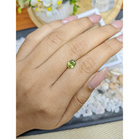 1.23 Ct. Yellowish Green Sapphire from Madagascar Life Style