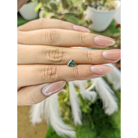0.85 Ct. Bluish Green Sapphire from Madagascar Life Style