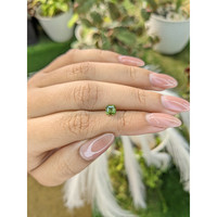 0.85 Ct. Yellowish Green Sapphire from Madagascar Life Style