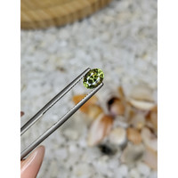 1.10 Ct. Yellowish Green Sapphire from Madagascar Life Style