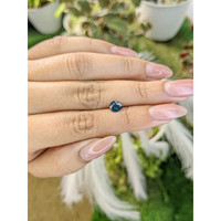 0.76 Ct. Greenish Blue Sapphire from Madagascar Life Style