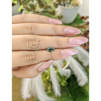 0.90 Ct. Green Sapphire from Madagascar Life Style