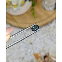 0.79 Ct. Greenish Blue Sapphire from Madagascar Life Style