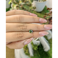 1.12 Ct. Yellowish Green Sapphire from Madagascar Life Style