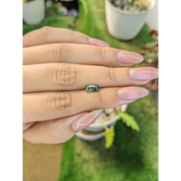 1.01 Ct. Yellowish Green Sapphire from Madagascar Life Style