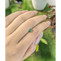 0.82 Ct. Yellowish Green Sapphire from Madagascar Life Style