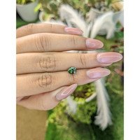 0.98 Ct. Green Sapphire from Madagascar Life Style