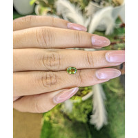 0.99 Ct. Yellowish Green Sapphire from Madagascar Life Style