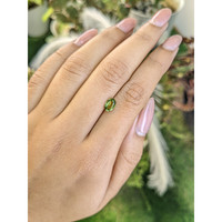 0.99 Ct. Yellowish Green Sapphire from Madagascar Life Style
