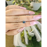 0.75 Ct. Greenish Blue Sapphire from Madagascar Life Style