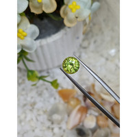 3.02 Ct. Yellowish Green Sapphire from Madagascar Life Style