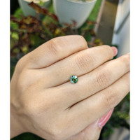 0.75 Ct. Green Sapphire from Madagascar Life Style
