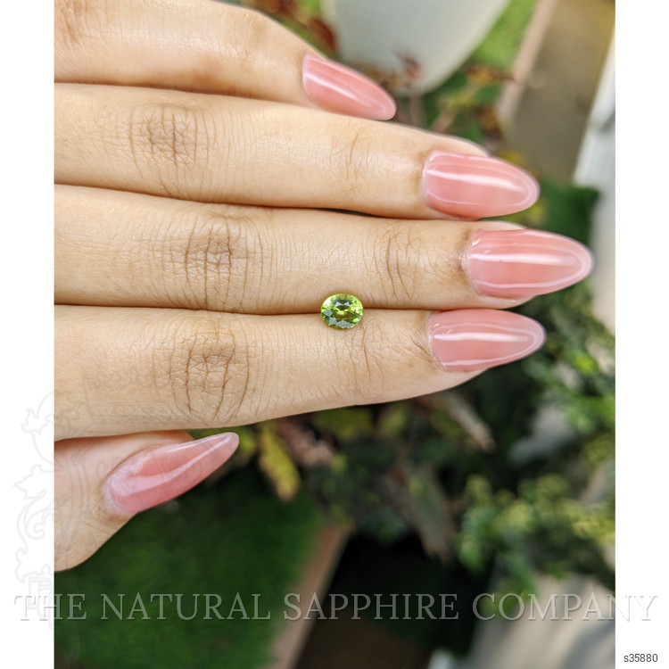 0.86 Ct. Yellowish Green Sapphire from Madagascar