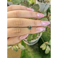 0.91 Ct. Bluish Green Sapphire from Madagascar Life Style