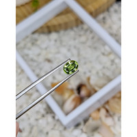 0.91 Ct. Yellowish Green Sapphire from Madagascar Life Style