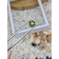 1.02 Ct. Yellowish Green Sapphire from Madagascar Life Style