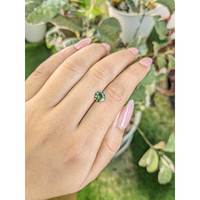 1.02 Ct. Yellowish Green Sapphire from Madagascar Life Style