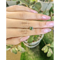1.02 Ct. Yellowish Green Sapphire from Madagascar Life Style