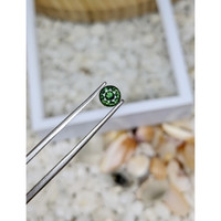 0.57 Ct. Bluish Green Sapphire from Madagascar Life Style