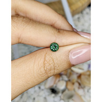 0.57 Ct. Bluish Green Sapphire from Madagascar Life Style