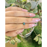 0.80 Ct. Bluish Green Sapphire from Madagascar Life Style
