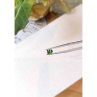 0.61 Ct. Green Sapphire from Madagascar Life Style