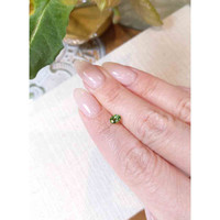 0.61 Ct. Green Sapphire from Madagascar Life Style