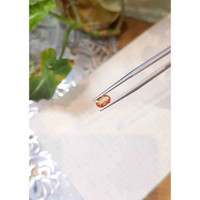 0.74 Ct. Orange Sapphire from Madagascar Life Style
