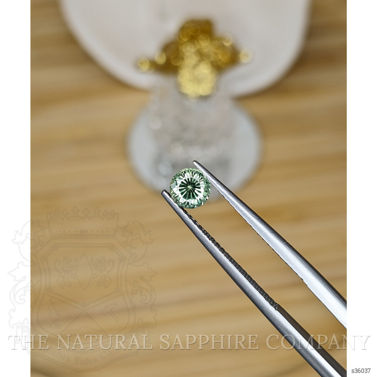 0.66 Ct. Yellowish Green Sapphire from Madagascar