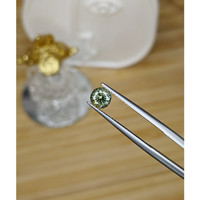 0.72 Ct. Yellowish Green Sapphire from Madagascar Life Style