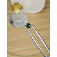 0.71 Ct. Green Sapphire from Madagascar Life Style