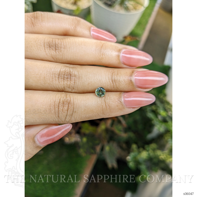 0.74 Ct. Yellowish Green Sapphire from Madagascar